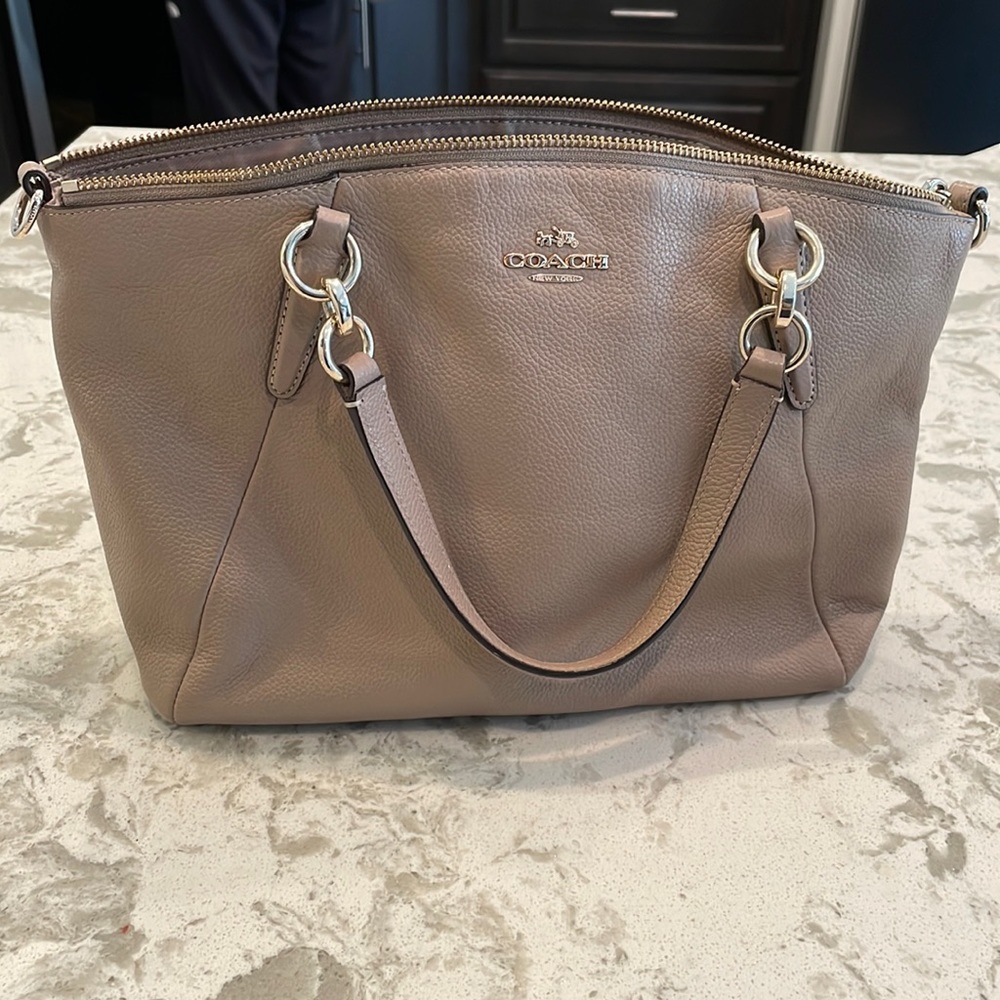 Tan coach handbag